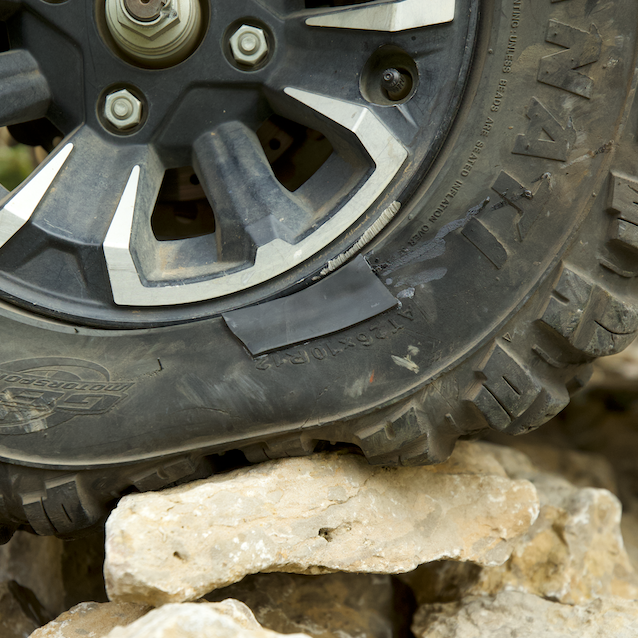 Customer repair of a torn SxS tire sidewall using GlueTread patch and adhesive