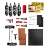 GlueTread sidewall repair kit contents including rubber patches, adhesive, sanding square, plugs, C02 and application tools