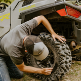 GlueTread repair installed on SxS tire during off-road use in rocky terrain